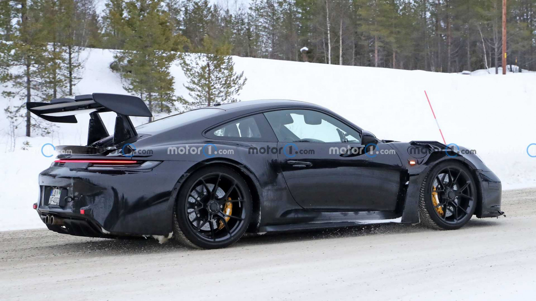 Porsche 4 (4) GT4 RS Test Mule Spotted In The Snow  News  - porsche 992 gt3 rs